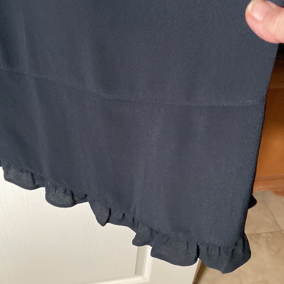 Whitewash brand skirt. Very black with a gentle ruffle on the bottom. - Picture 2 of 7